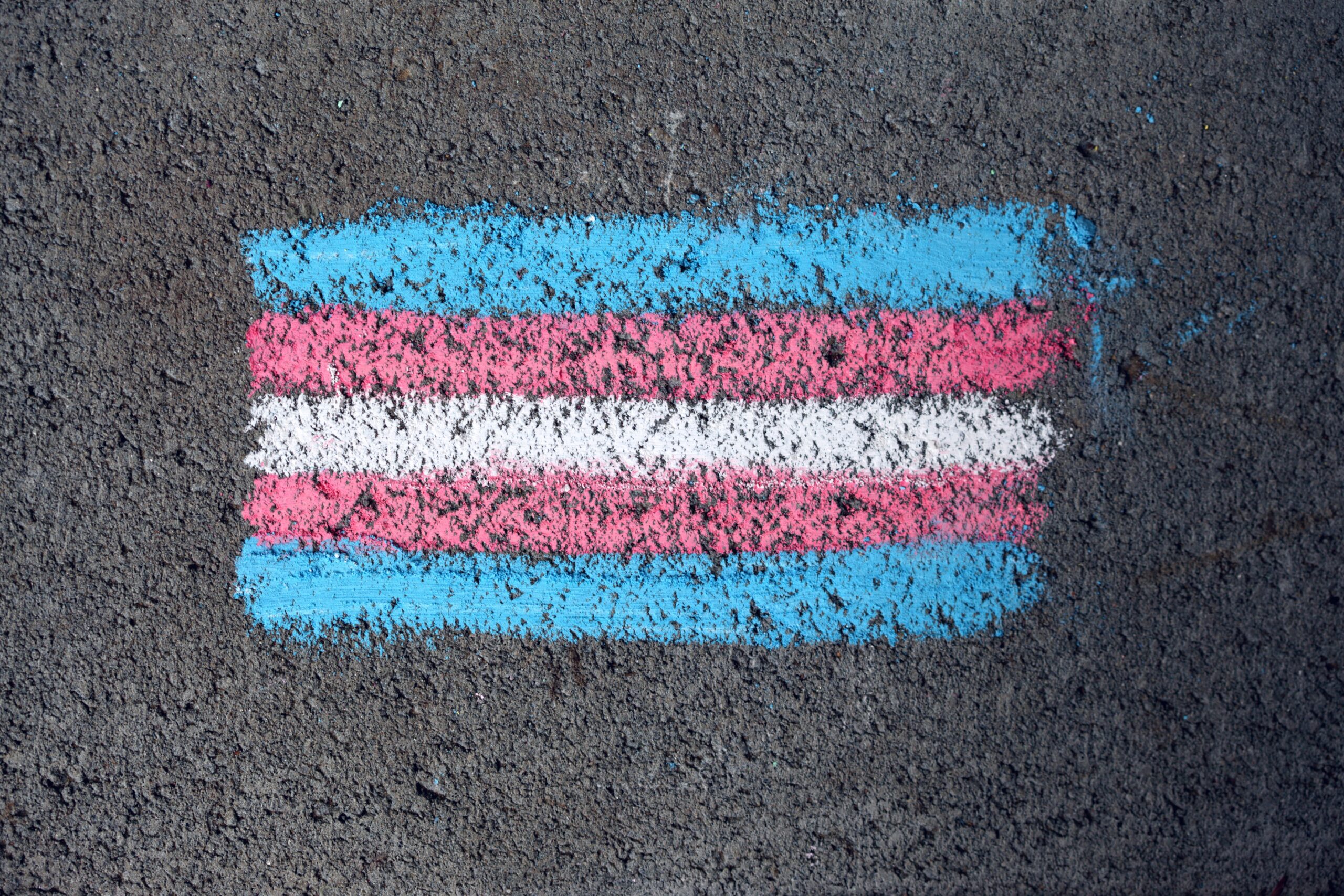 trans flag drawn in chalk